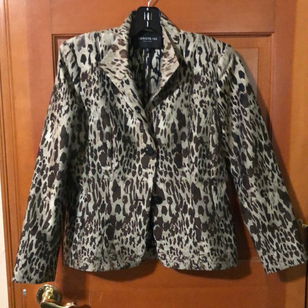 nearly new jacket. Matching dress sold separately